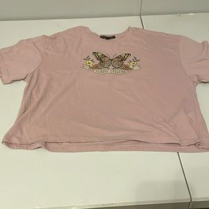 rose gold “always revolving” loose crop top.